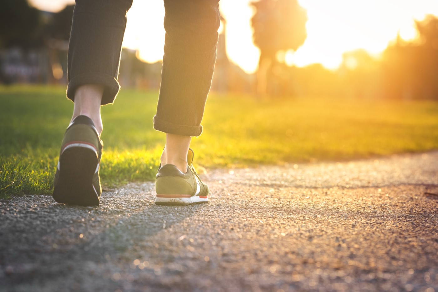 Woman stretching outdoors in soft morning light